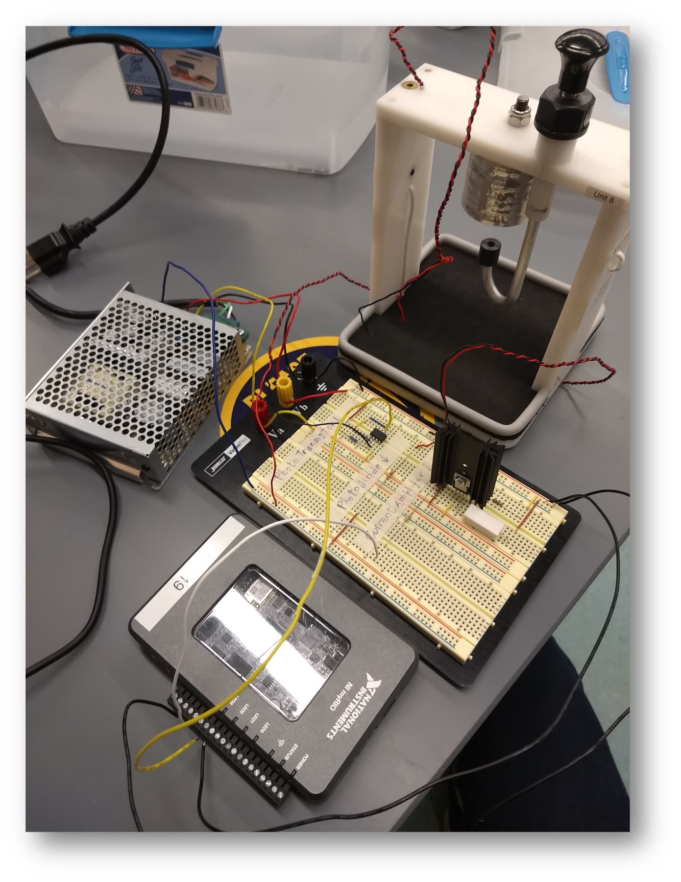Physical implementation — electromagnet, optical gap sensing, driver.